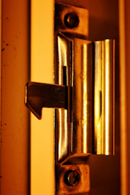 A close up of a door handle on a door