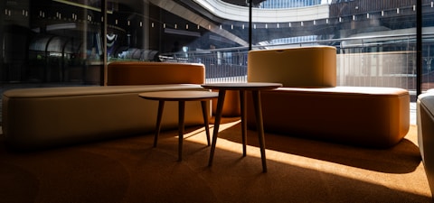 A room with a couch and a table in it