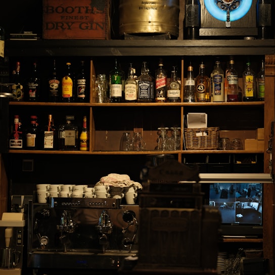A room filled with lots of bottles of alcohol