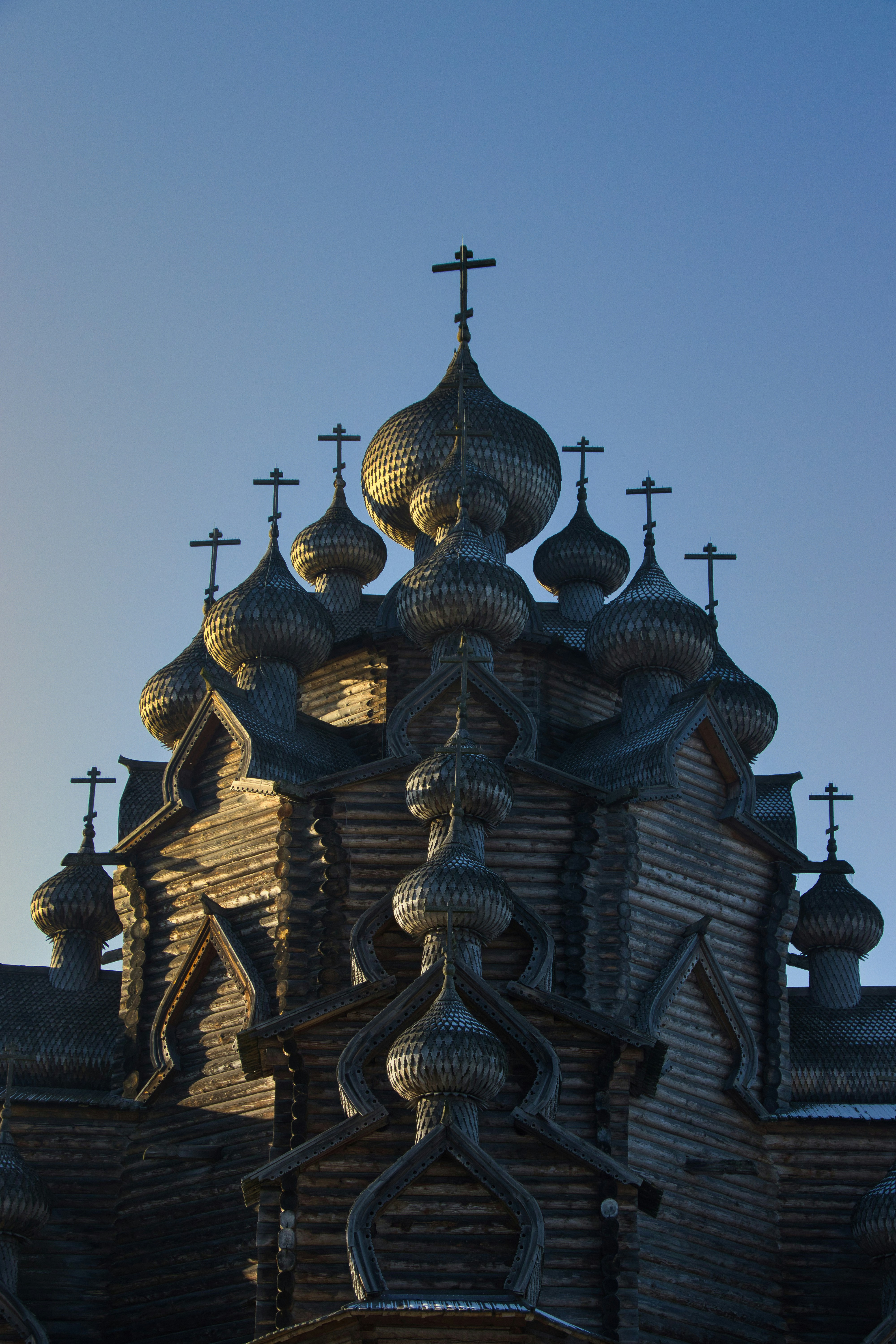 A church with a steeple and crosses on it