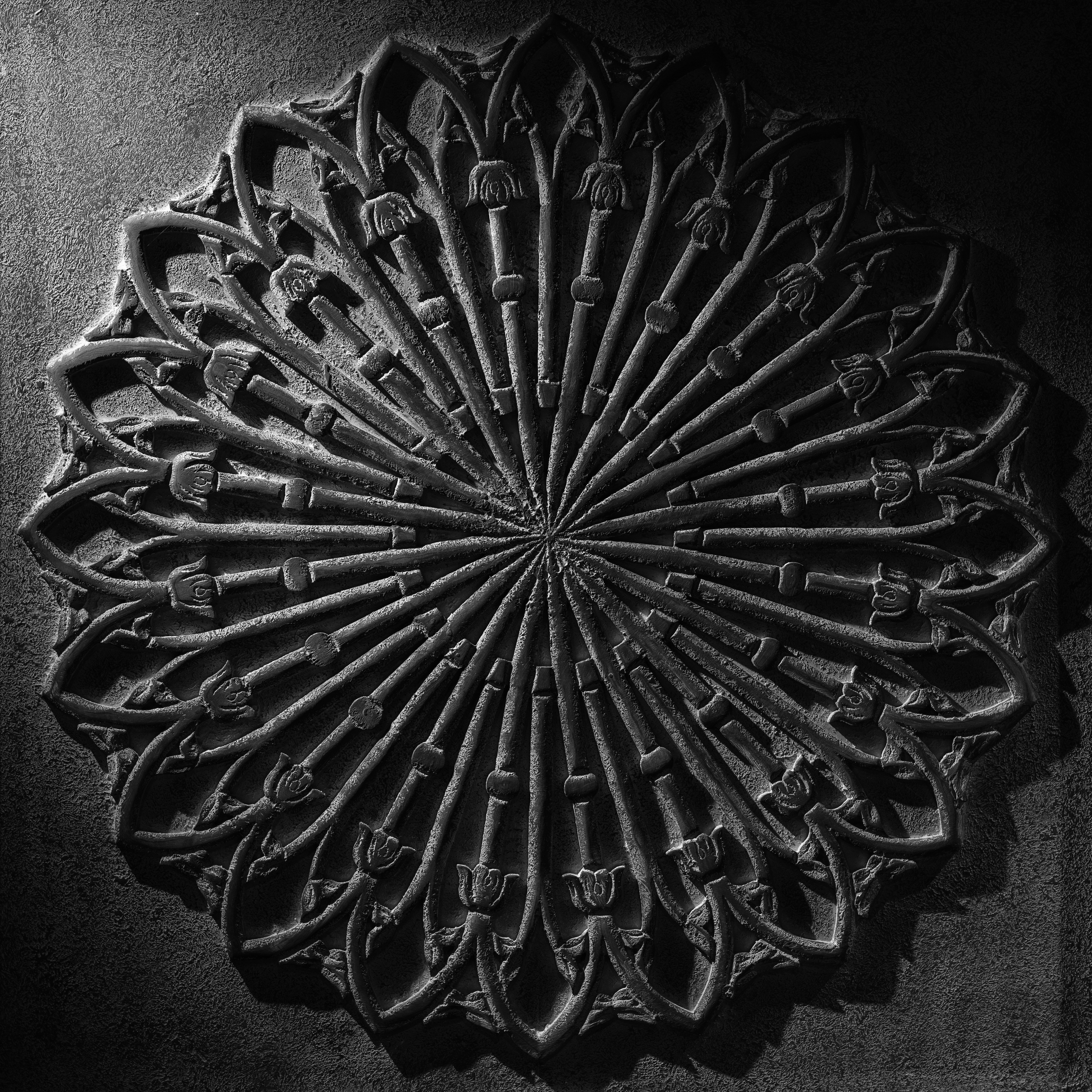 A black and white photo of a decorative object