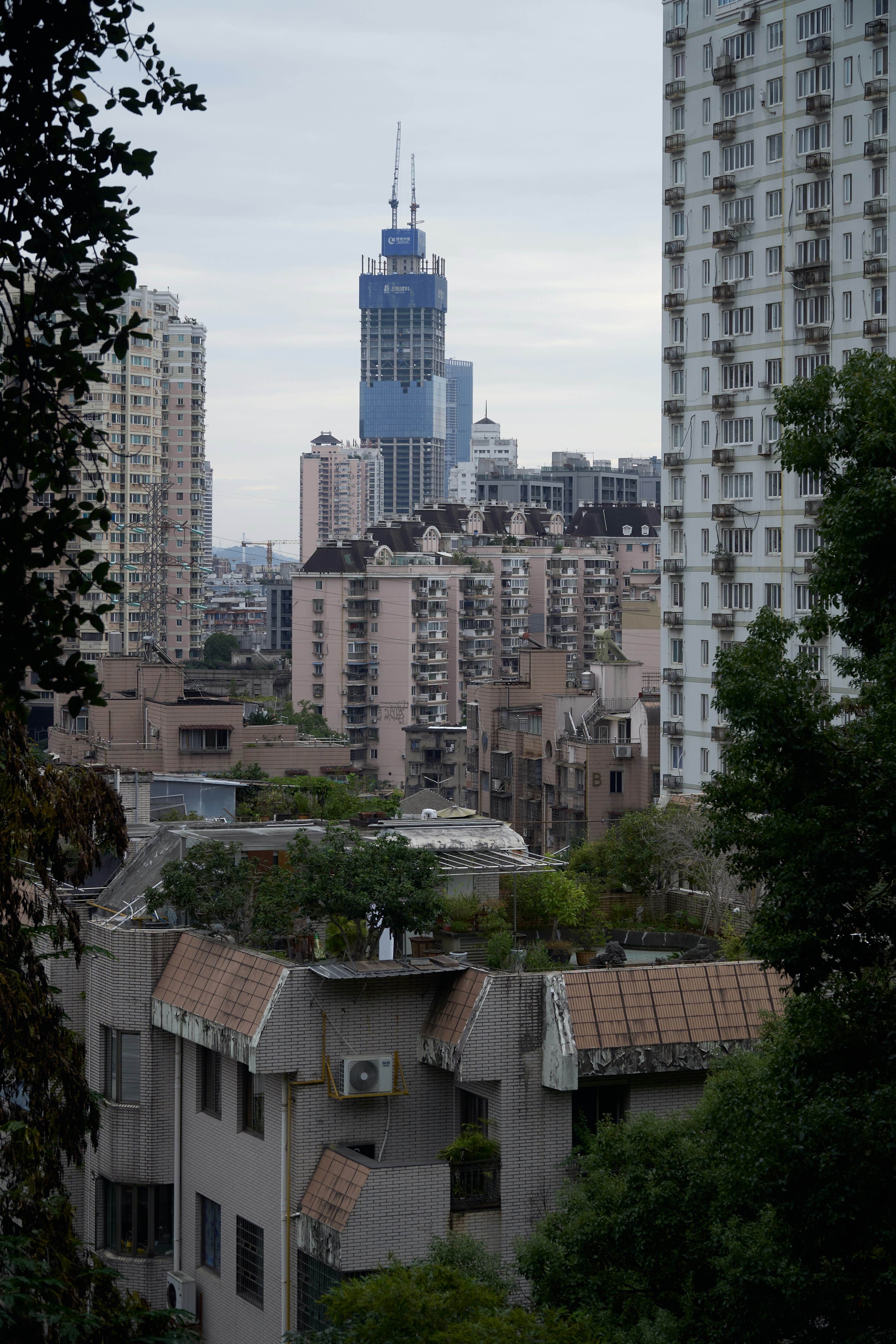 A view of a city with tall buildings photo – Free China Image on Unsplash