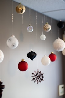 A bunch of ornaments hanging from a ceiling