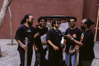 A group of men standing next to each other