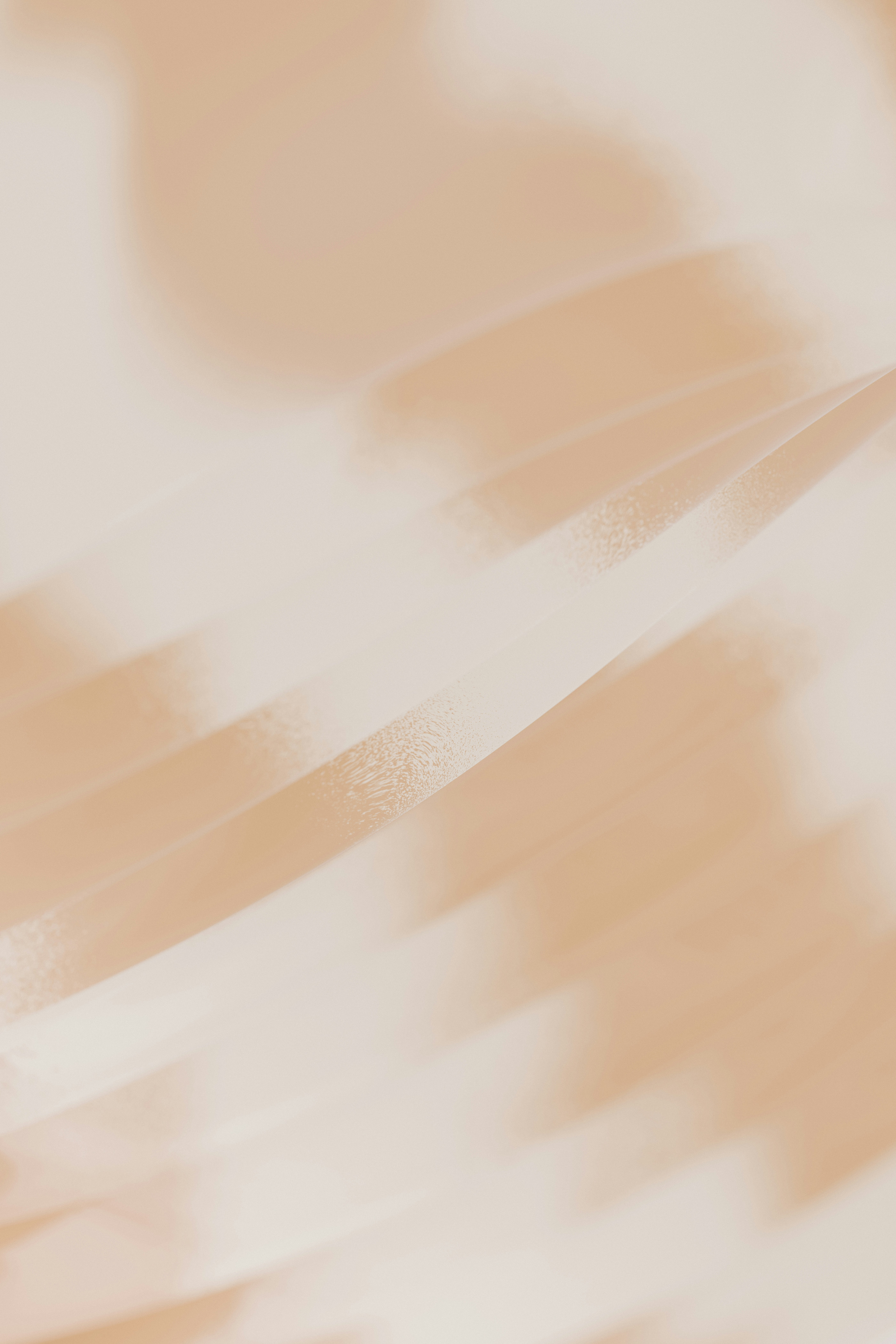 A blurry photo of a person holding a cell phone