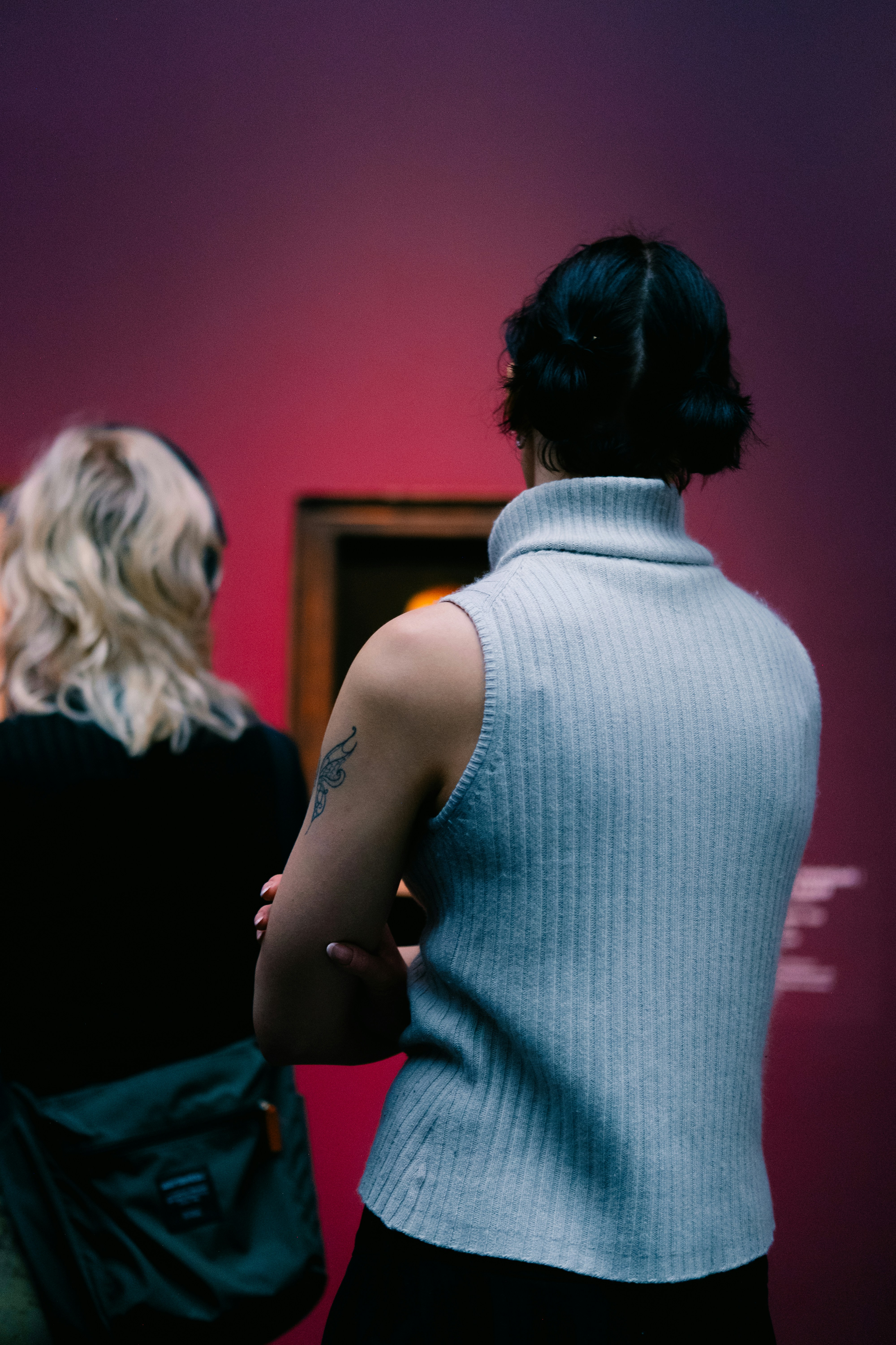 A couple of women standing next to each other