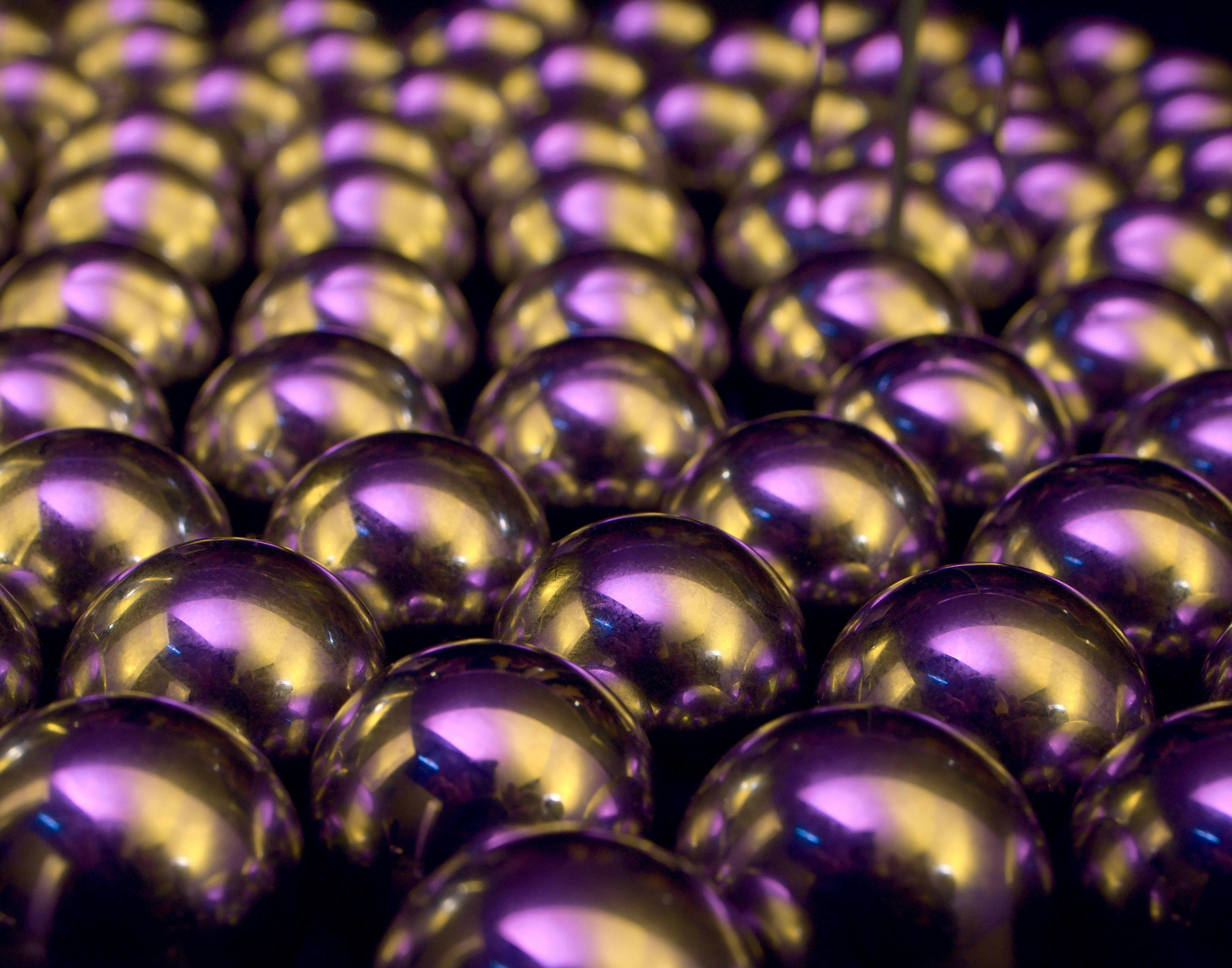 A large group of shiny purple balls