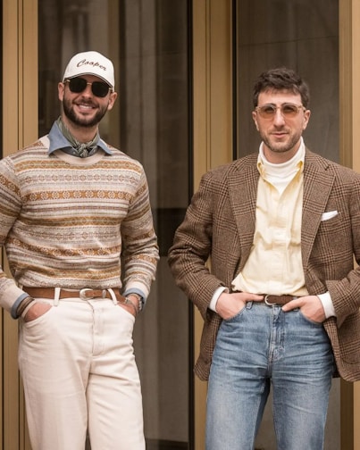 A couple of men standing next to each other