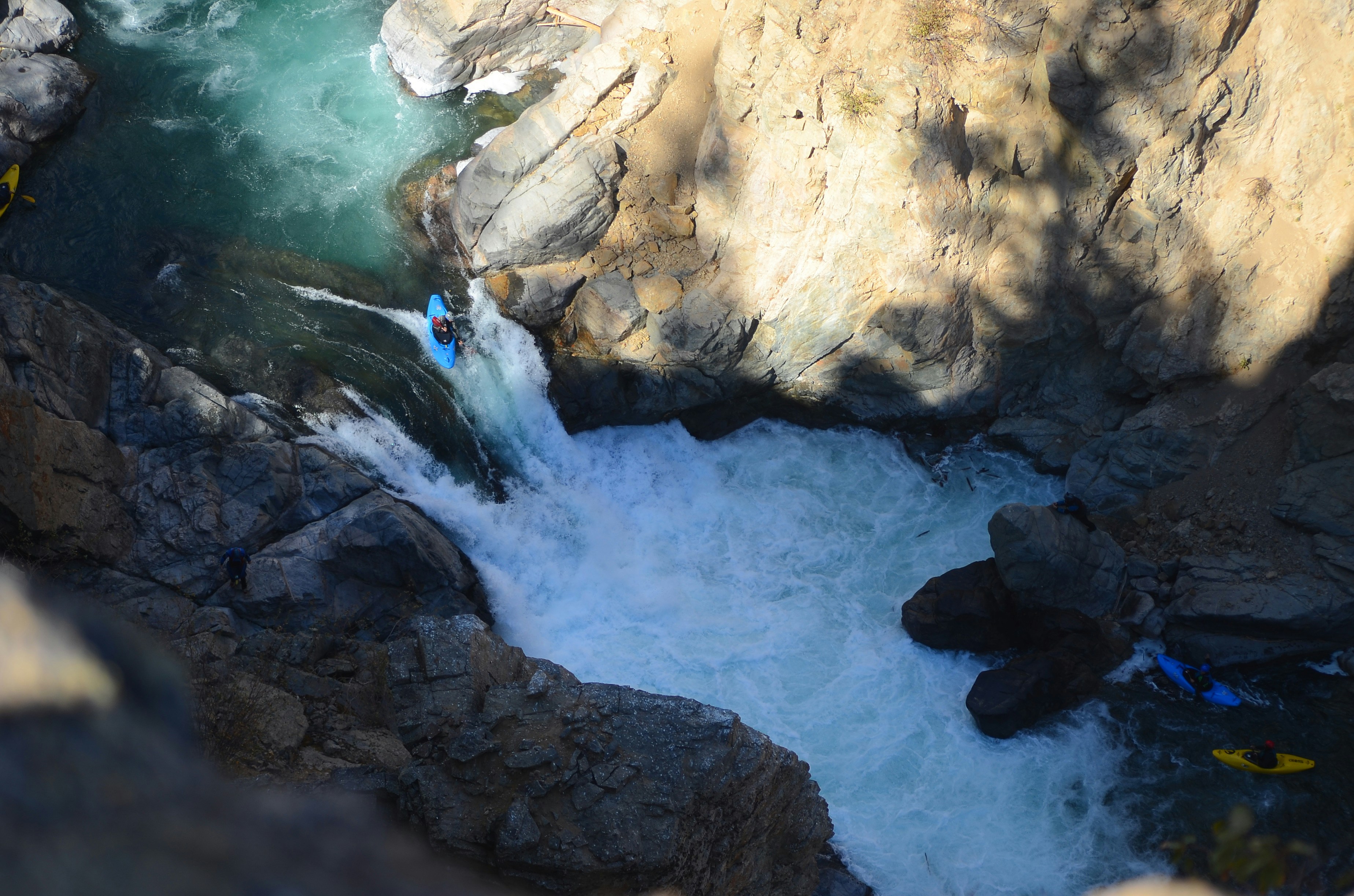 A view of a river running through some rocks