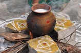 A clay pot sitting on top of a table