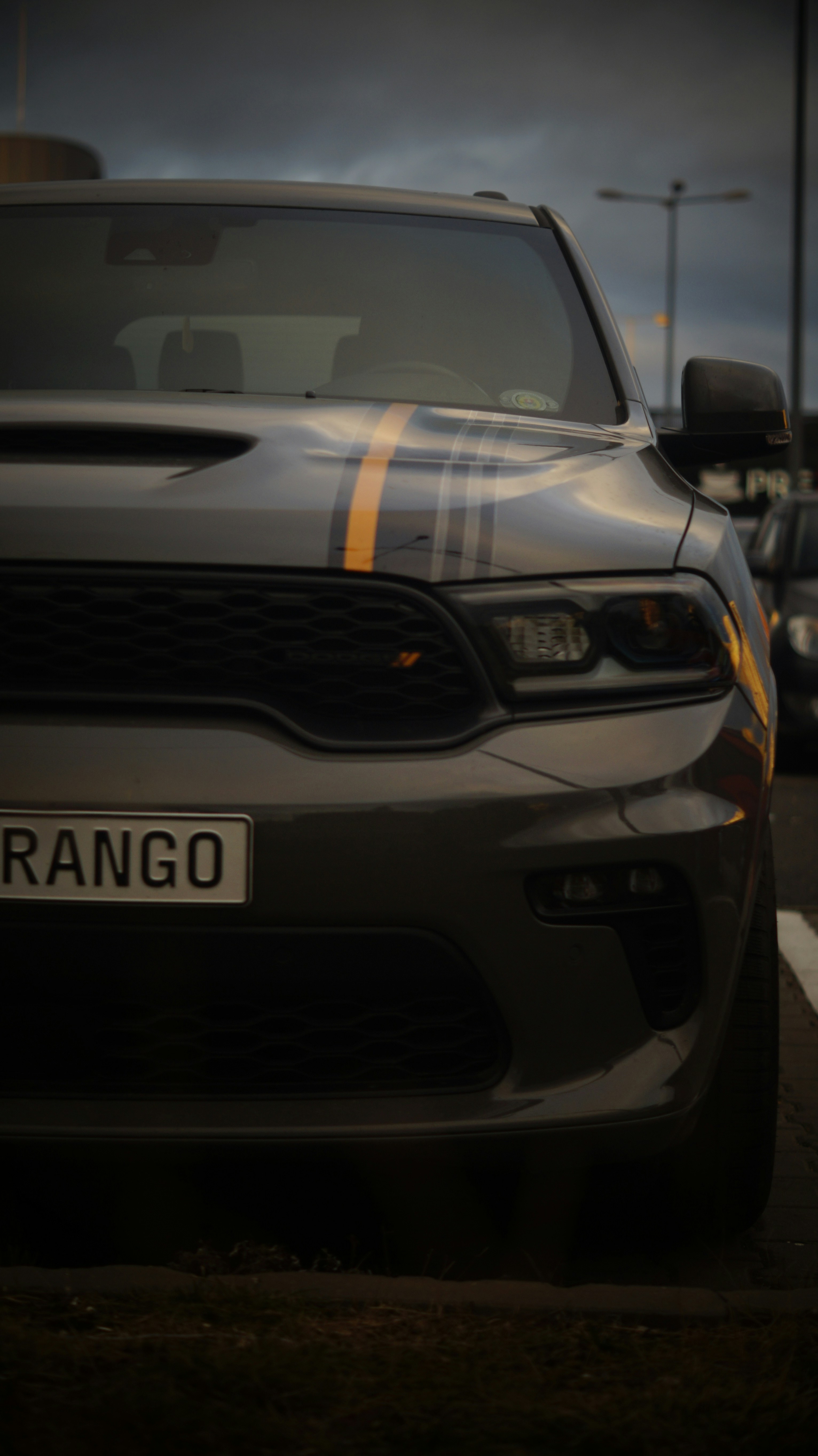 A car that is sitting in the street