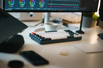 A computer monitor sitting on top of a desk