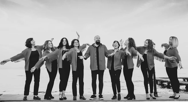 A group of people standing next to each other