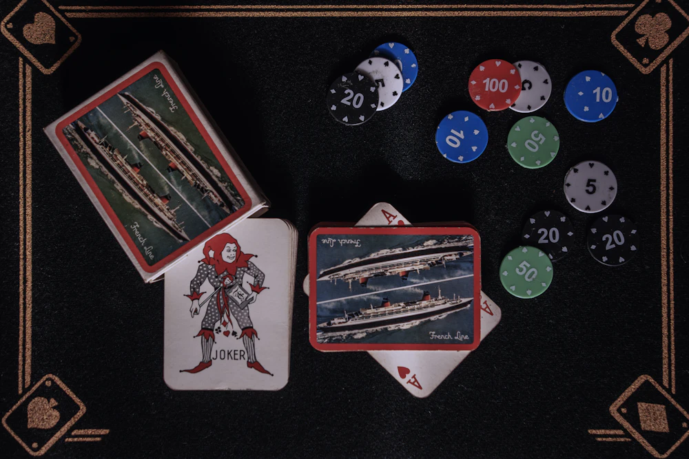 Playing cards and casino chips on gaming table
