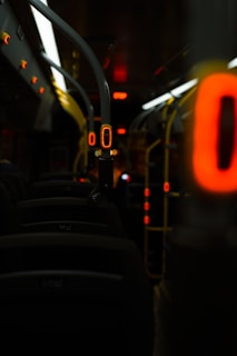 A view of the inside of a bus at night