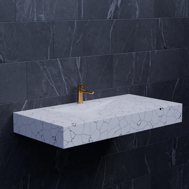 A white sink sitting on top of a white counter
