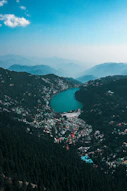 A scenic view of a lake surrounded by mountains