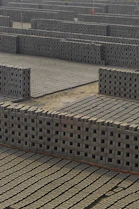 A large number of cinder blocks stacked together