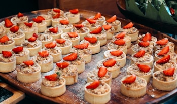 A tray of food with carrots on top of it