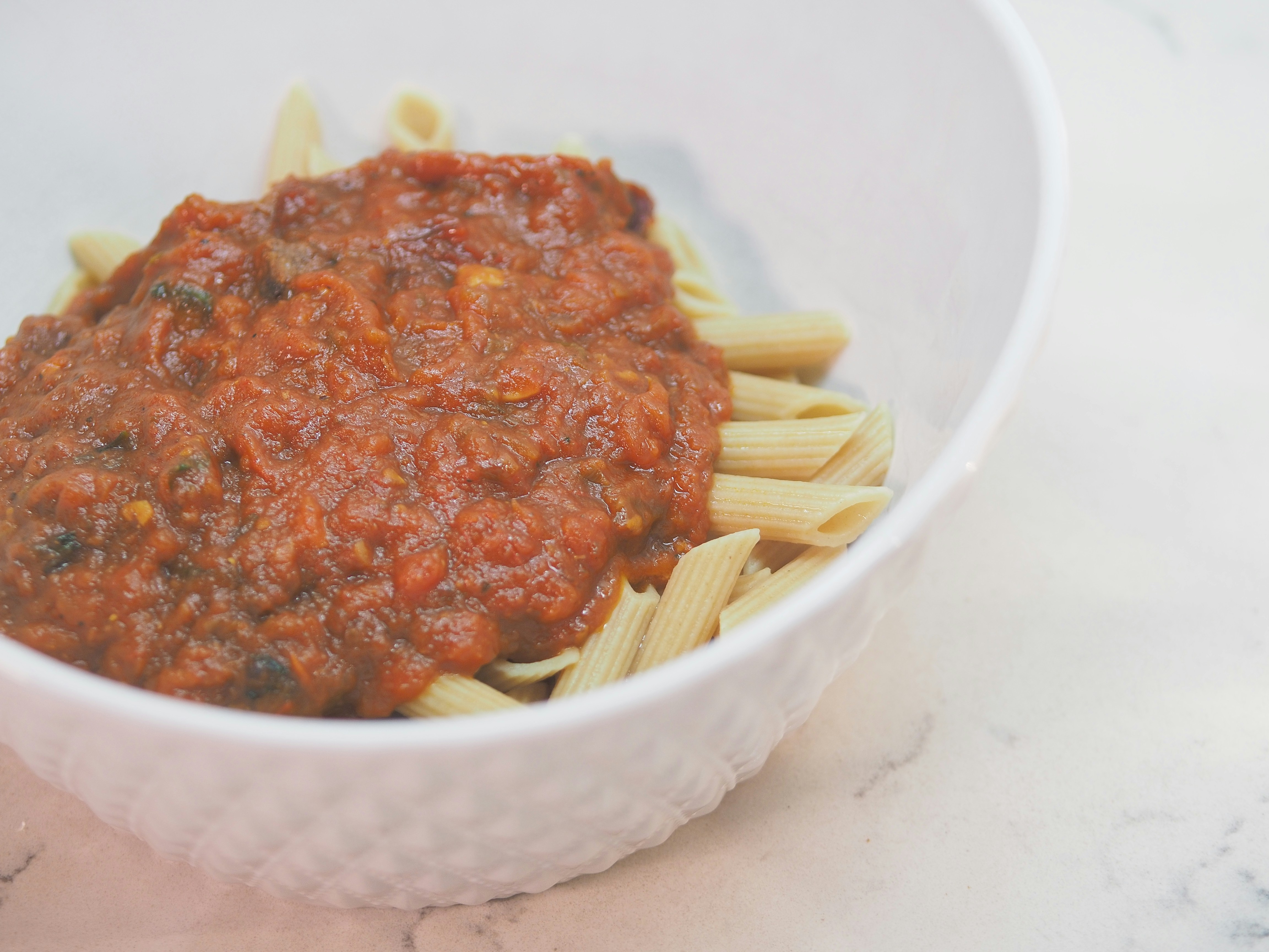 Red Sauce Pasta — Penne in rich tomato sauce, Indian café food photography with warm colours and appetising presentation
