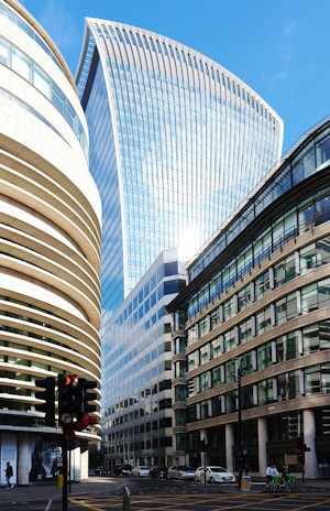A couple of tall buildings sitting next to each other