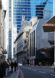 A city street filled with lots of tall buildings