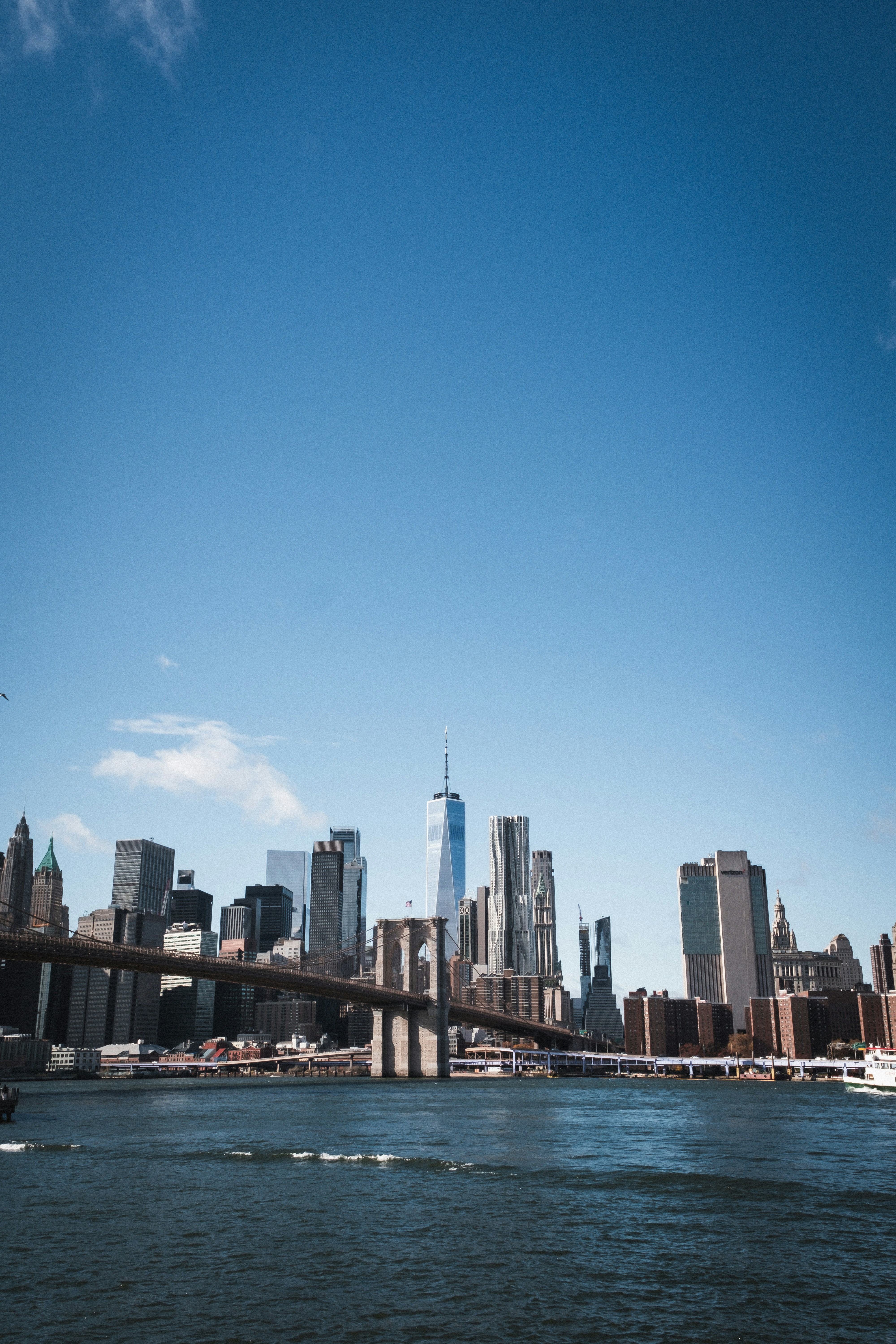 A large body of water with a city in the background