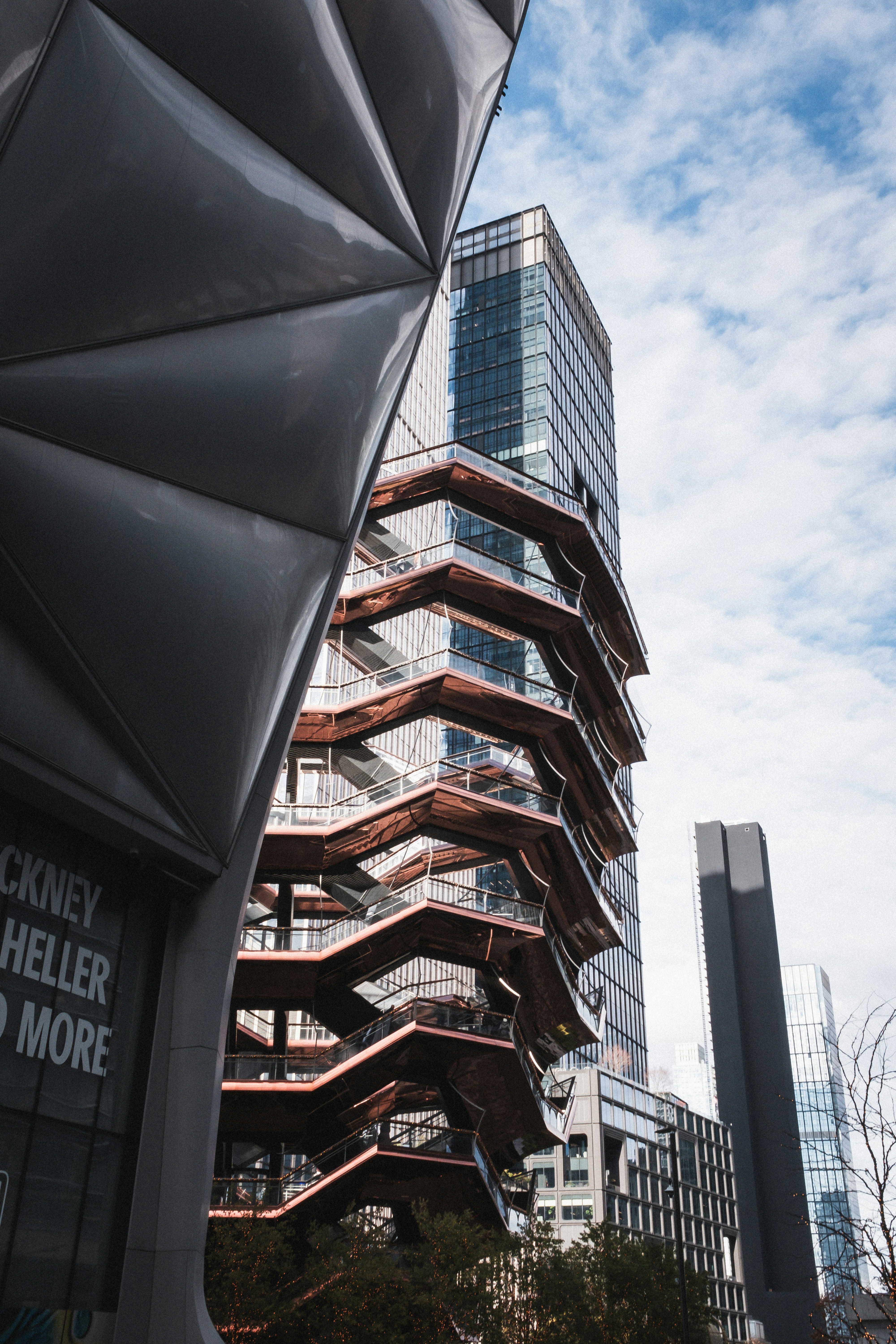 A tall building next to other tall buildings