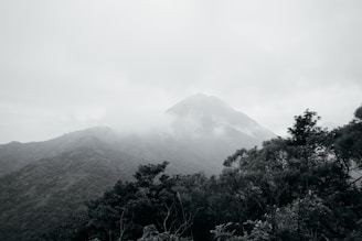 A black and white photo of a mountain