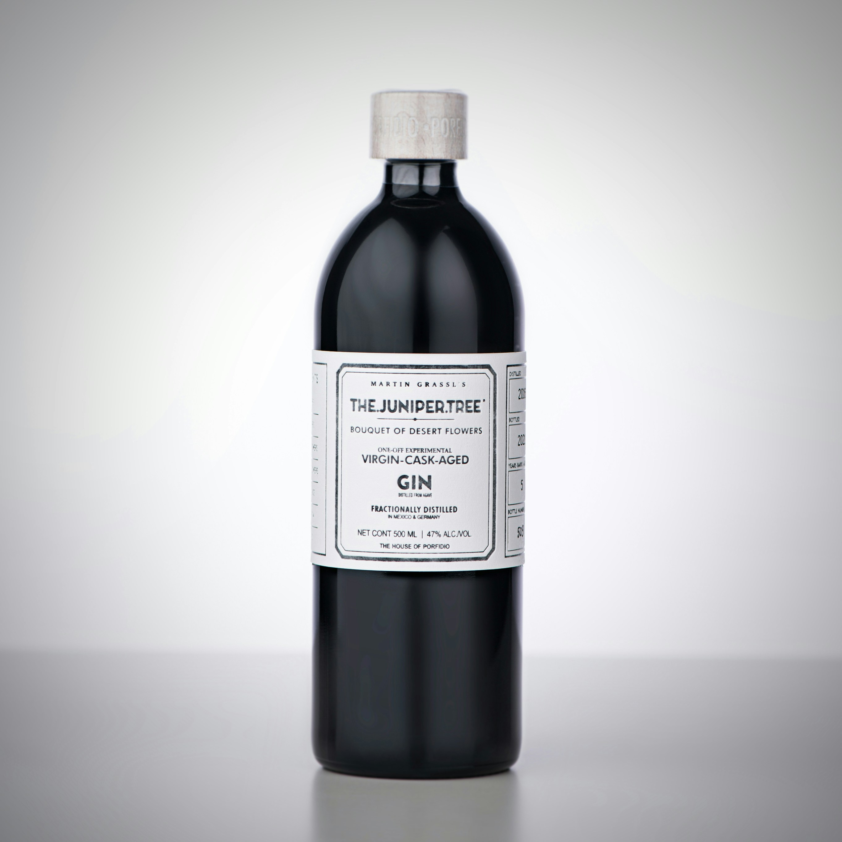 A bottle of wine sitting on top of a table