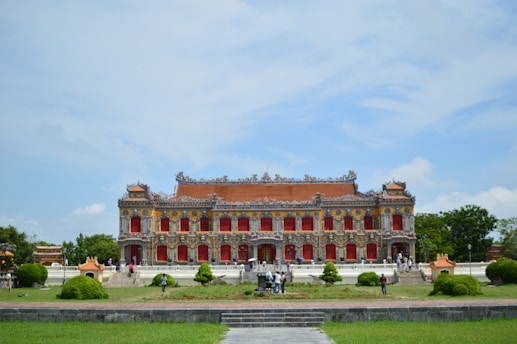 A large building with a long walkway in front of it