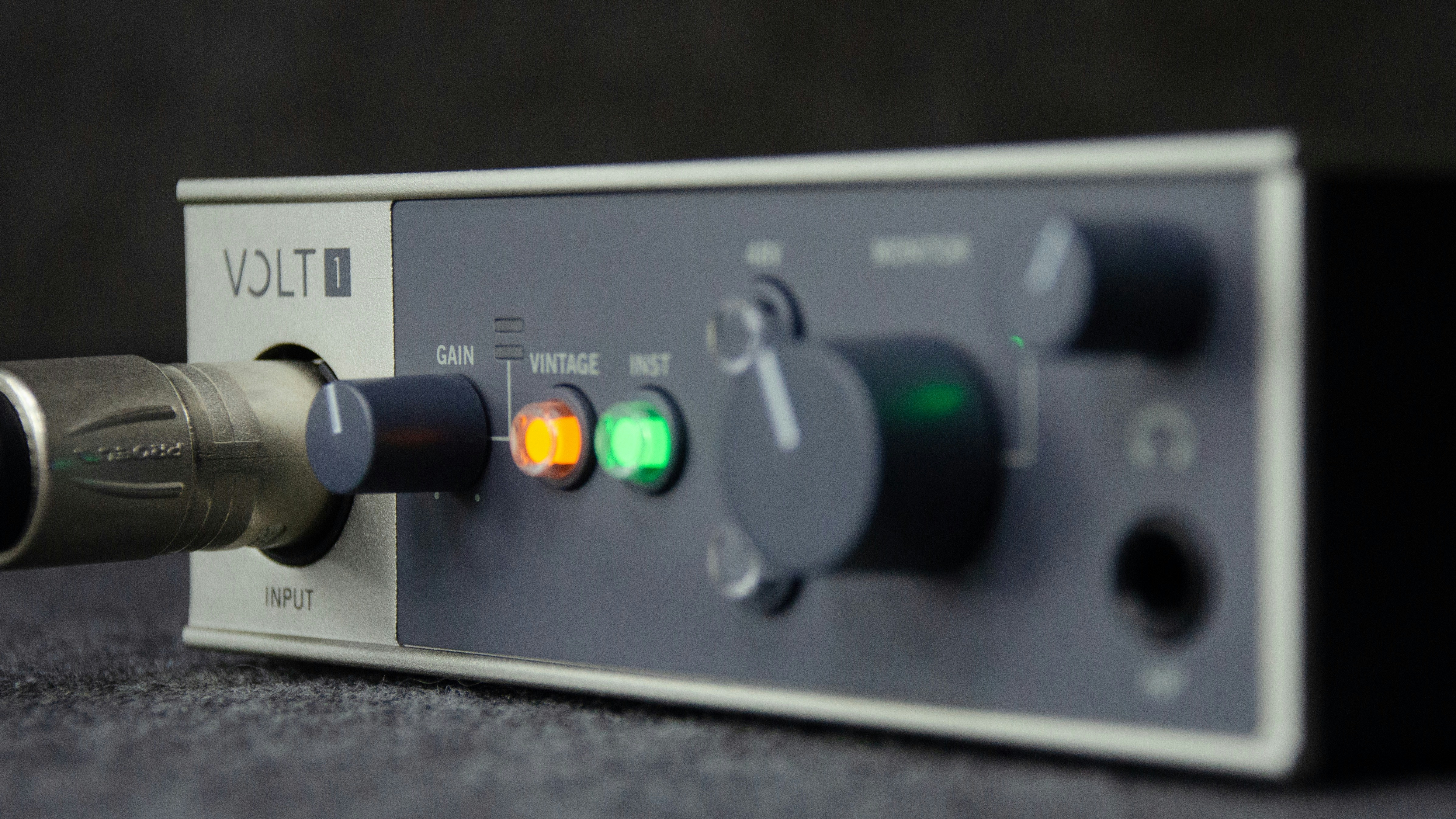 A close up of an electronic device with a microphone