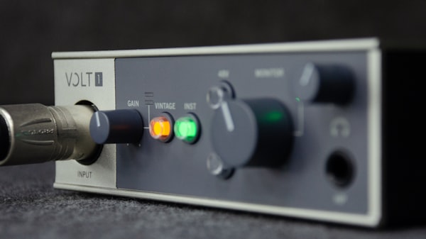 A close up of an electronic device with a microphone