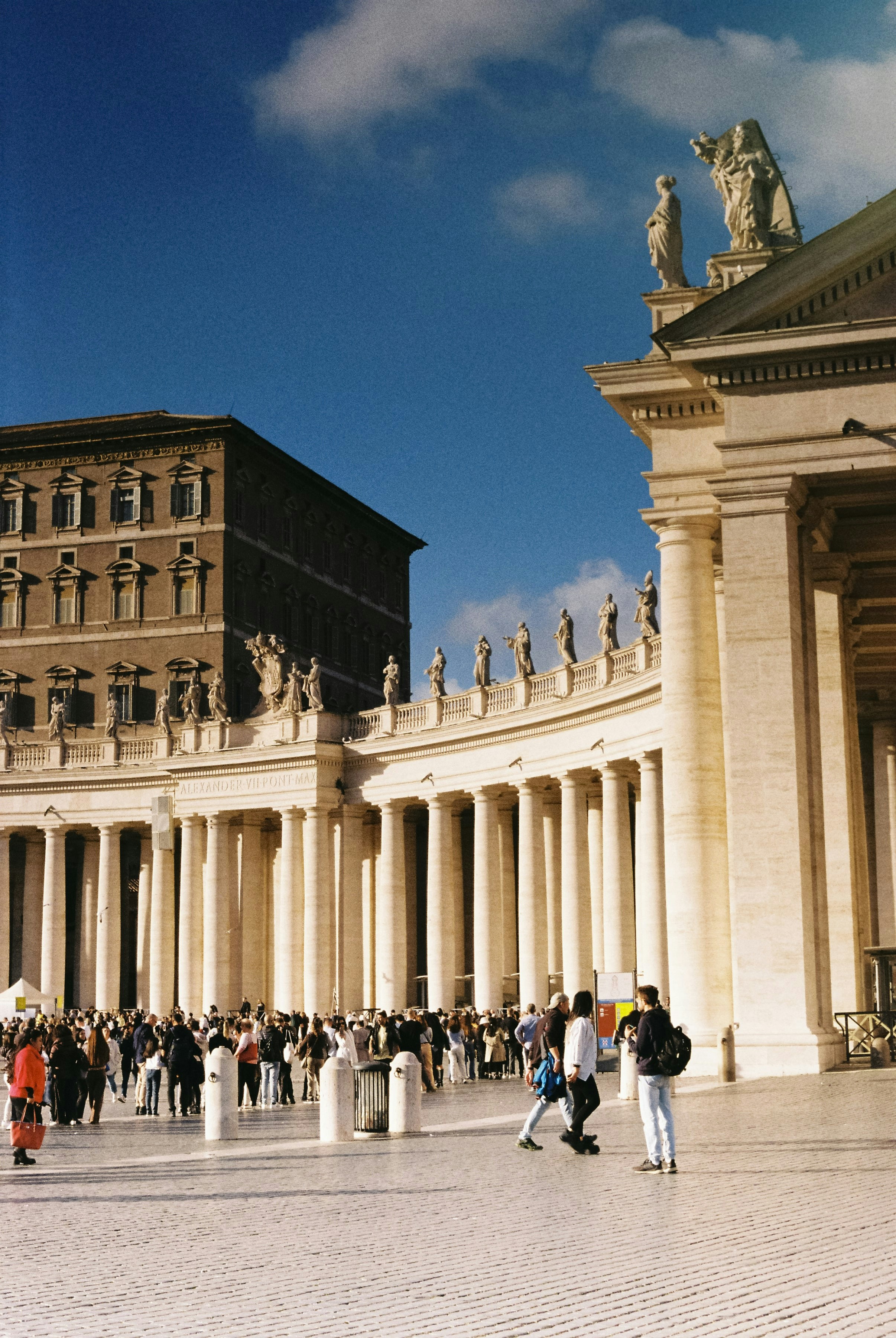 A group of people standing in front of a building