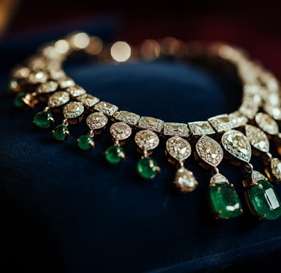 A close up of a green and white necklace
