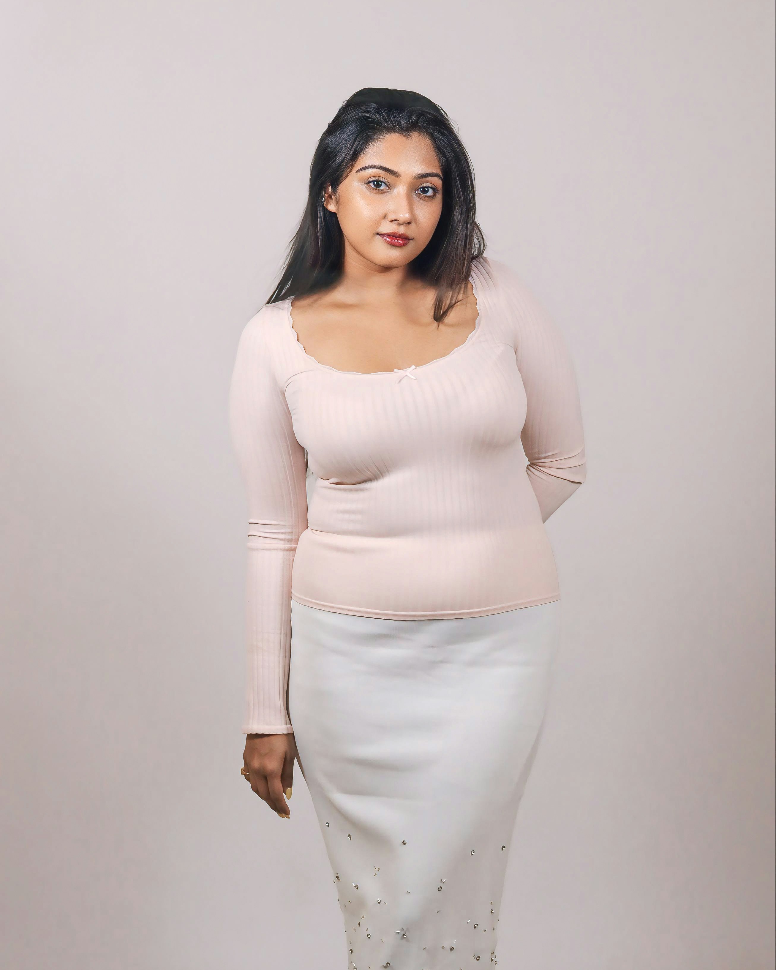 A woman in a white skirt and a pink top photo – Free Portrait Image on ...