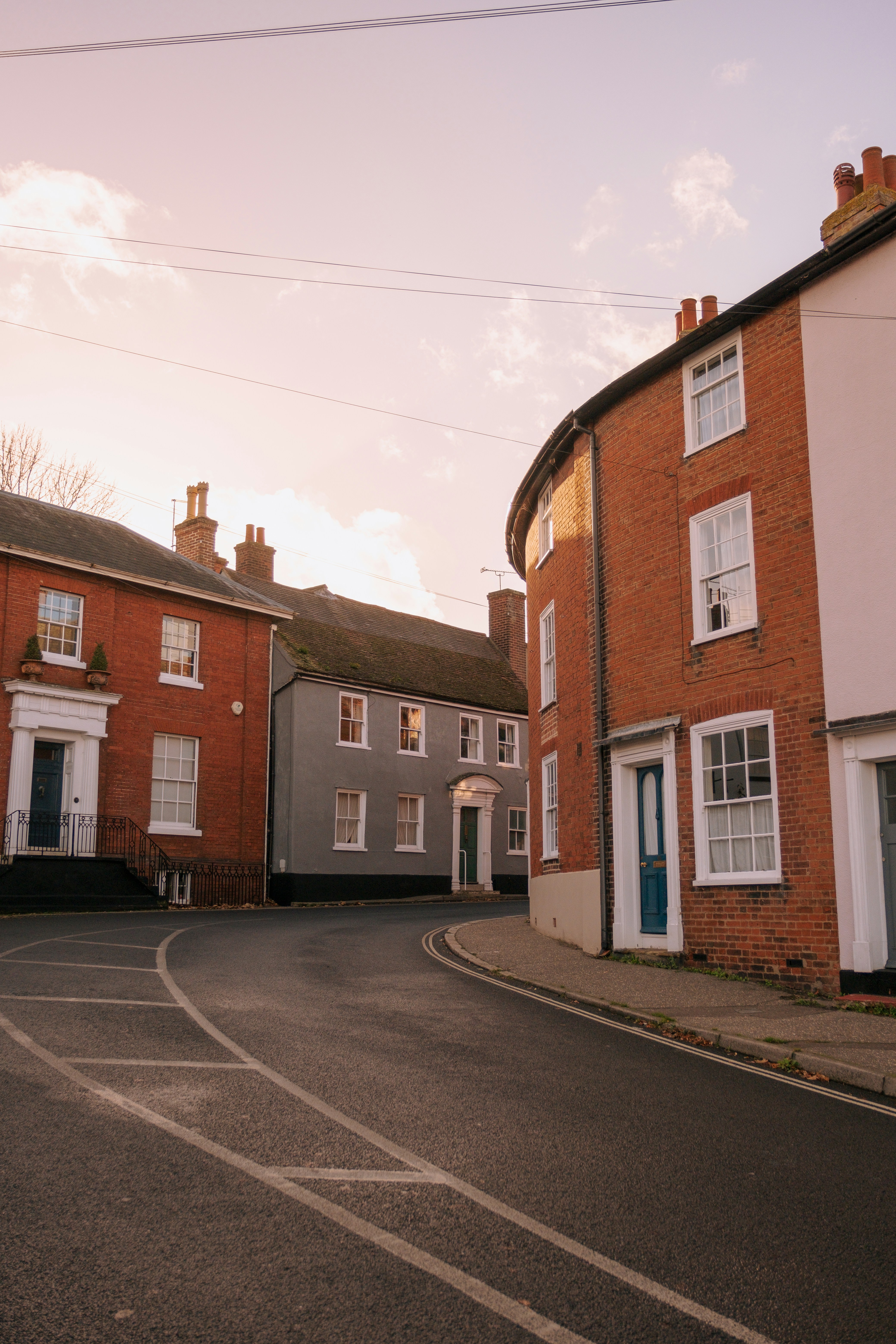 A street in a small town with brick buildings