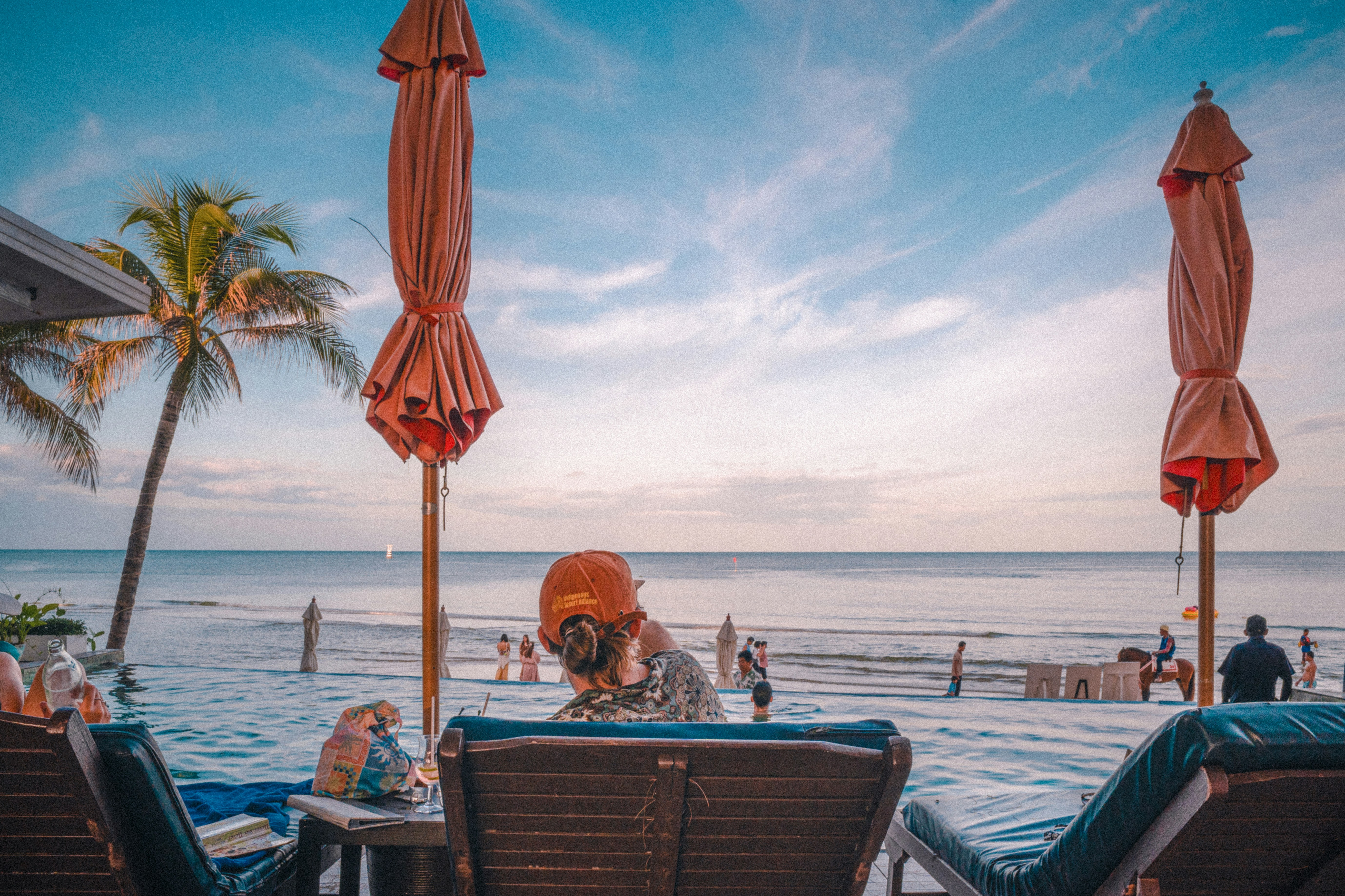 A group of lawn chairs sitting on top of a beach