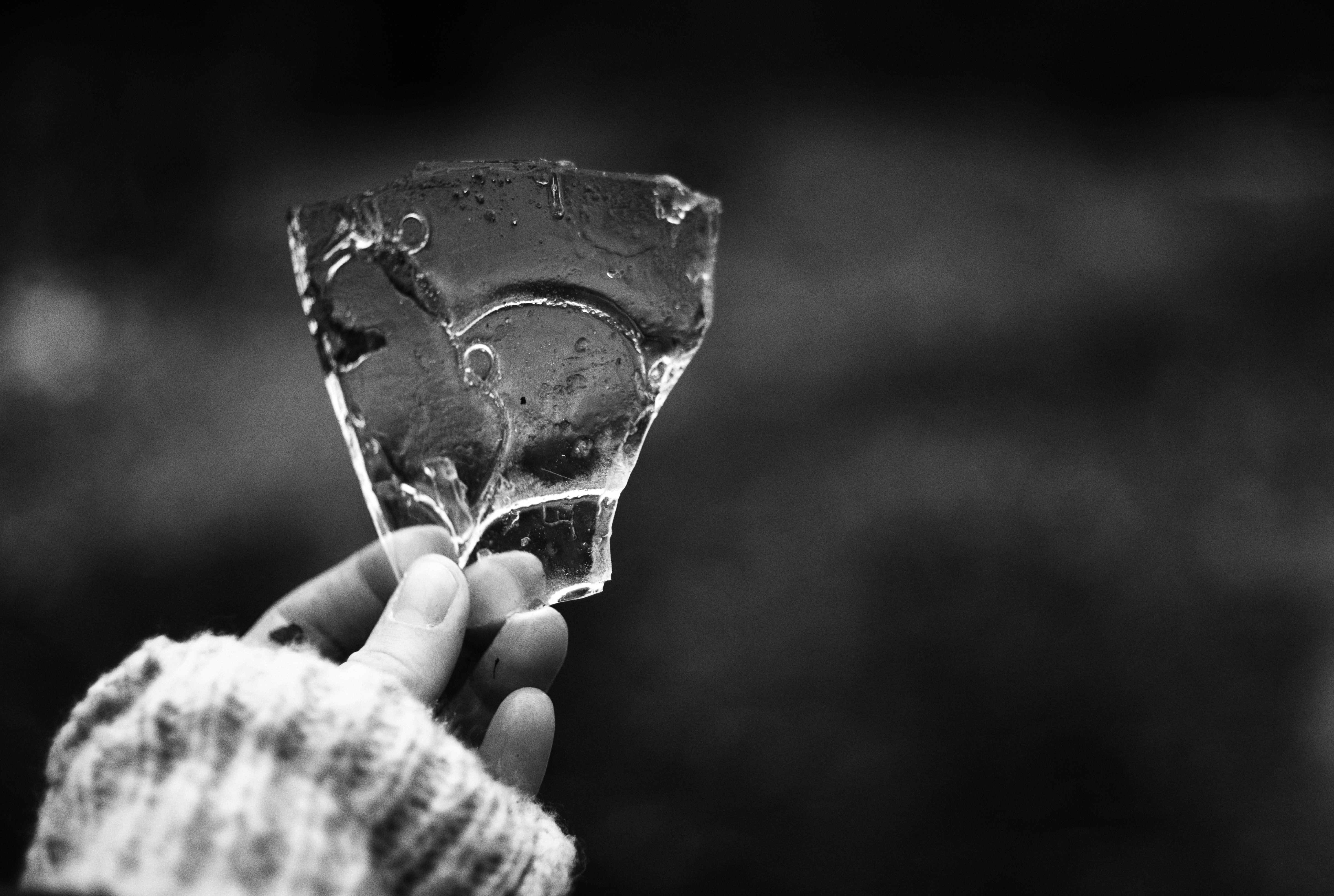 A person holding a piece of ice in their hand to ground themselves - grounding techniques anxiety relief