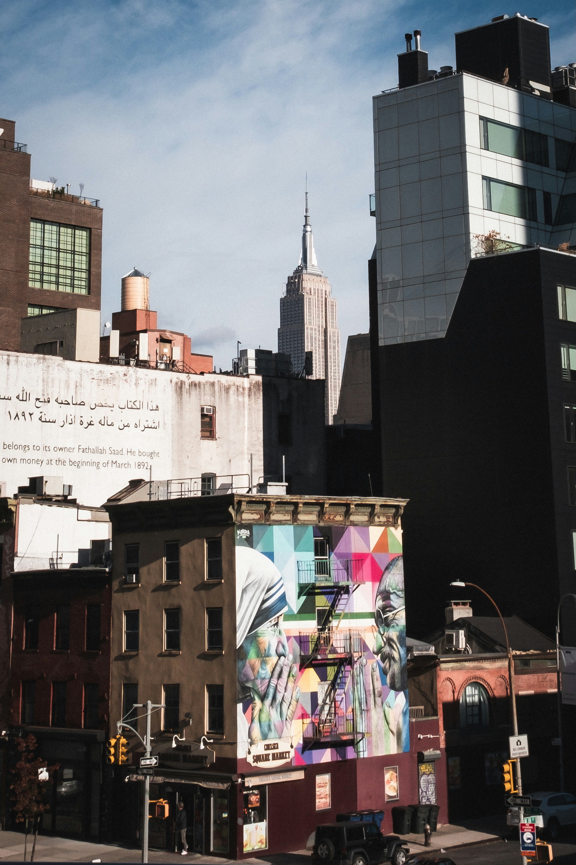 A city street filled with lots of tall buildings