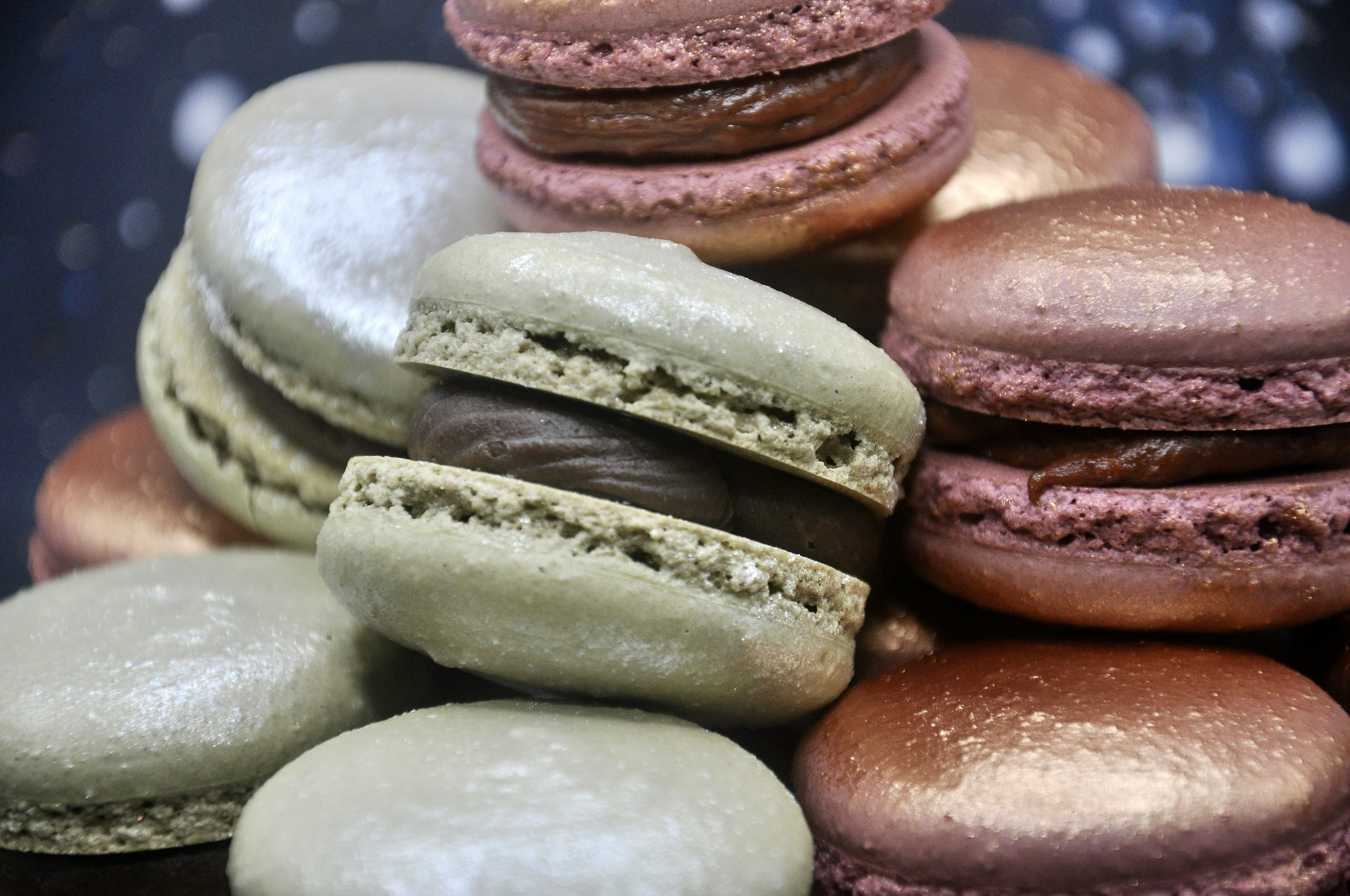 Close-up of pastel macarons showing perfect feet and smooth shells