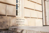 A close up of a building with a sign on it