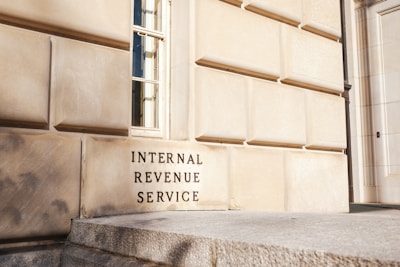 A close up of a building with a sign on it