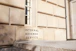 A close up of a building with a sign on it