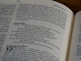 A close up of an open book on a table