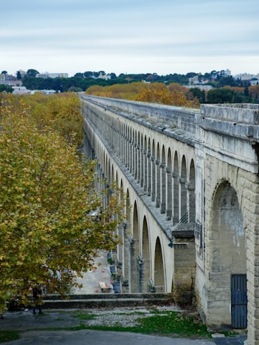 A stone bridge with arches and arches on it