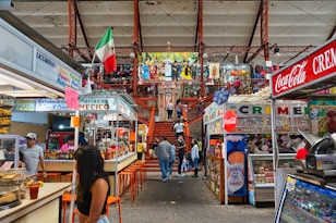A store filled with lots of items and people