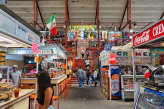A store filled with lots of items and people