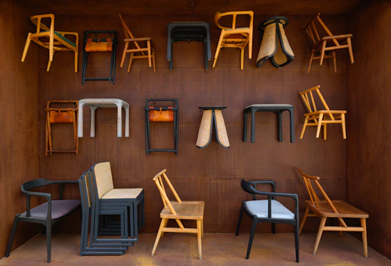 A room filled with lots of different types of chairs
