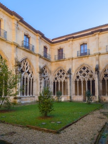A large building with a lawn in front of it